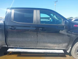 2021 Chevrolet Silverado 1500 LT Trail Boss with VIN 1GCPYFED7MZ407580, listed as a IAAI auction lot 42078081 with 64,299 mi miles and . Bid and sale history available at DreamBid. Image 13.