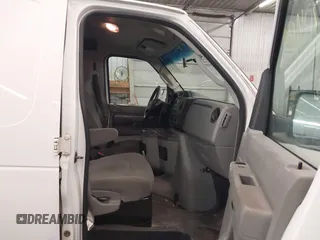 2011 Ford Econoline Cargo Commercial with VIN 1FTNE1EW9BDB06341, listed as a IAAI auction lot 41704699 with 207,452 mi miles and . Bid and sale history available at carsss.com. Image 5.