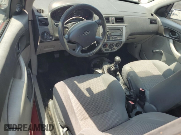 2005 Ford Focus S z VIN 3FAFP31N85R162165, wystawiony jako Copart lot #57292245 z przebiegiem 240 463 mil mil oraz Szkoda całkowita • Salvage title. Historia ofert i sprzedaży dostępna na DreamBid. Obrazek 8.