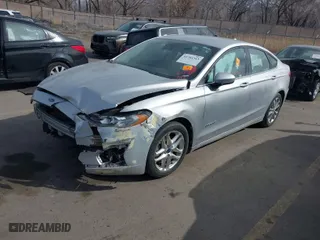2019 Ford Fusion Hybrid SE with VIN 3FA6P0LU5KR140266, listed as a IAAI auction lot 41703313 with 1 mi miles. Bid and sale history available at carsss.com. Image 2.