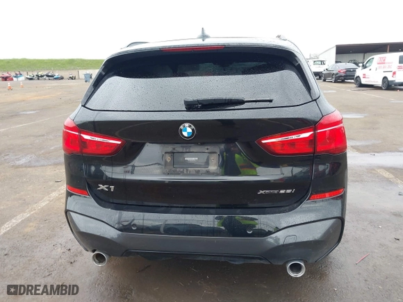 2021 BMW X1 xDrive28i with VIN WBXJG9C01M3M71033, listed as a IAAI auction lot 41723970 with 71,000 mi miles. Bid and sale history available at carsss.com. Image 16.