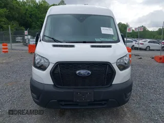 2022 Ford Transit Cargo with VIN 1FTBR1C85NKA74578, listed as a IAAI auction lot 42316744 with 63,376 mi miles and . Bid and sale history available at DreamBid. Image 12.