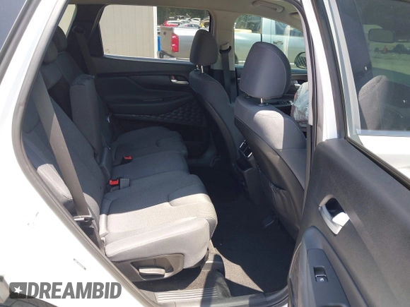 2019 Hyundai Santa Fe SE with VIN 5NMS23AD0KH013811, listed as a IAAI auction lot 42337926 with 87,000 mi miles and . Bid and sale history available at DreamBid. Image 8.