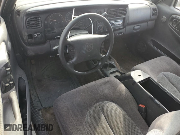 1997 Dodge Dakota z VIN 1B7GG23Y8VS161313, wystawiony jako Copart lot #77646454 z przebiegiem 286 443 mil mil oraz Szkoda całkowita • Salvage title. Historia ofert i sprzedaży dostępna na DreamBid. Obrazek 8.