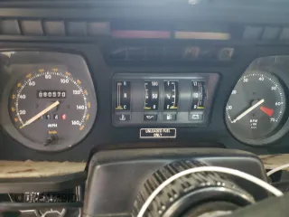 1989 Jaguar XJS z VIN SAJNV4847KC151989, wystawiony jako Copart lot #61401054 z przebiegiem 80 570 mil mil oraz Szkody całkowita. Historia ofert i sprzedaży dostępna na DreamBid. Obrazek 9.