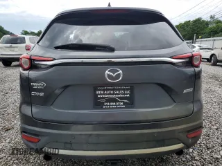 2018 Mazda CX-9 Grand Touring with VIN JM3TCADY7J0211781, listed as a Copart auction lot 59477885 with 77,667 mi miles and Salvage title. Bid and sale history available at DreamBid. Image 6.