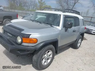 2007 Toyota FJ Cruiser with VIN JTEBU11F270030712, listed as a IAAI auction lot 42076564 with 265,000 mi miles. Bid and sale history available at carsss.com. Image 6.