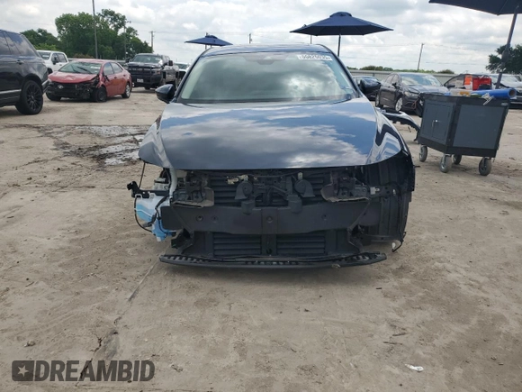 2023 Mazda 3 S Carbon Edition with VIN 3MZBPACM9PM366679, listed as a Copart auction lot 55825035 with 19,745 mi miles and Salvage title. Bid and sale history available at DreamBid. Image 5.