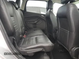 2016 Ford Escape SE z VIN 1FMCU0G91GUC59990, wystawiony jako Copart lot #56956395 z przebiegiem 112 706 mil mil oraz Szkoda całkowita • Salvage title. Historia ofert i sprzedaży dostępna na DreamBid. Obrazek 11.