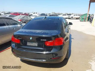 2014 BMW 3 Series 328i xDrive with VIN WBA3B5C50EF599480, listed as a IAAI auction lot 41755762 with 200,361 mi miles. Bid and sale history available at carsss.com. Image 16.