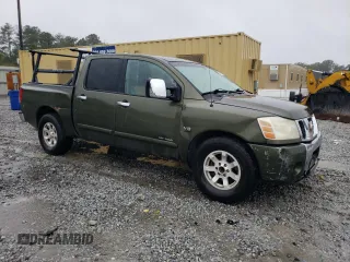 2004 Nissan Titan LE with VIN 1N6AA07A44N524855, listed as a Copart auction lot 73486464 with 322,599 mi miles and Salvage Title. Bid and sale history available at DreamBid. Image 4.