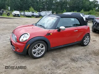 2015 MINI Convertible with VIN WMWZN3C54FT862210, listed as a Copart auction lot 43413825 with 45,313 mi miles and Salvage title. Bid and sale history available at DreamBid. Image 1.