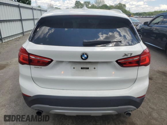 2018 BMW X1 xDrive28i with VIN WBXHT3C35J5F90062, listed as a Copart auction lot 56284945 with 138,137 mi miles and Salvage title. Bid and sale history available at DreamBid. Image 6.