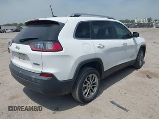 2019 Jeep Cherokee Latitude Plus with VIN 1C4PJLLBXKD220221, listed as a IAAI auction lot 42060125 with 89,452 mi miles and . Bid and sale history available at DreamBid. Image 4.