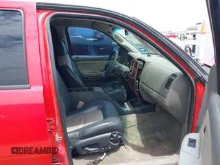 2005 Dodge Dakota SLT z VIN 1D7HE48N65S209630, wystawiony jako IAAI lot #42409822 z przebiegiem 224 849 mil mil oraz . Historia ofert i sprzedaży dostępna na DreamBid. Obrazek 5.