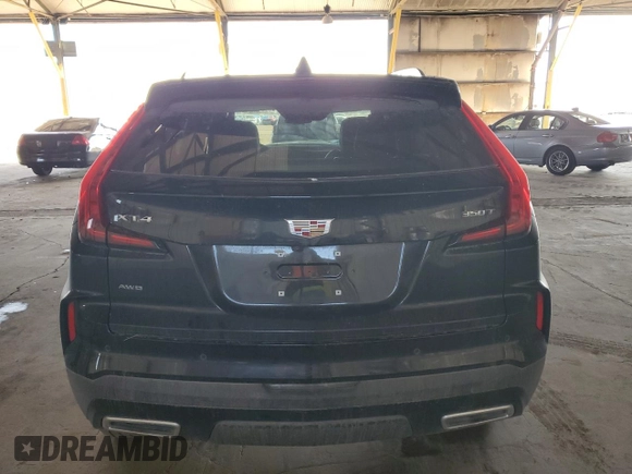 2024 Cadillac XT4 AWD Premium Luxury with VIN 1GYFZDR47RF153590, listed as a Copart auction lot 42846045 with 2,261 mi miles and Salvage title. Bid and sale history available at DreamBid. Image 6.