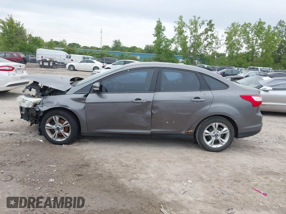 2013 Ford Focus SE with VIN 1FADP3F28DL348405, listed as a IAAI auction lot 42352749 with 252,134 mi miles and . Bid and sale history available at DreamBid. Image 14.