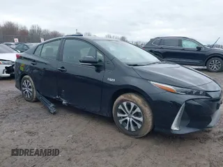 2021 Toyota Prius LE with VIN JTDKAMFP2M3165859, listed as a IAAI auction lot 41943098 with 20,306 mi miles and . Bid and sale history available at DreamBid. Image 1.