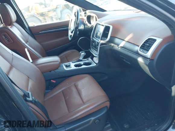 2018 Jeep Grand Cherokee Summit with VIN 1C4RJFJG1JC211047, listed as a IAAI auction lot 41133865 with 66,588 mi miles and . Bid and sale history available at DreamBid. Image 5.