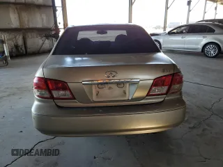 2004 Infiniti I35 z VIN JNKDA31A84T212784, wystawiony jako Copart lot #57489145 z przebiegiem 152 439 mil mil oraz Szkoda całkowita • Salvage title. Historia ofert i sprzedaży dostępna na DreamBid. Obrazek 6.