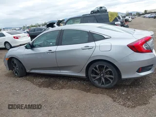 2021 Honda Civic Sport with VIN 2HGFC2F83MH510243, listed as a IAAI auction lot 41856857 with 95,739 mi miles and . Bid and sale history available at DreamBid. Image 14.