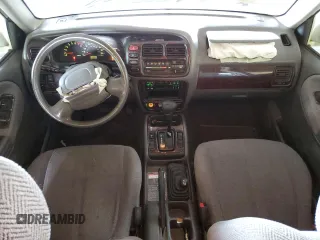1999 Suzuki Grand Vitara LX z VIN JS3TD62V3X4123048, wystawiony jako Copart lot #73007124 z przebiegiem 159 828 mil mil oraz Szkoda całkowita • Salvage title. Historia ofert i sprzedaży dostępna na DreamBid. Obrazek 8.