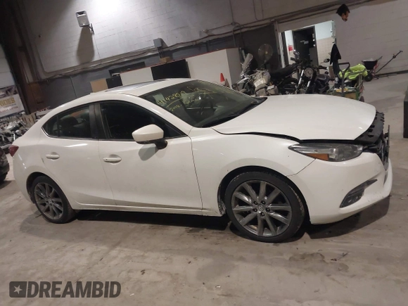 2018 Mazda 3 Touring z VIN 3MZBN1V32JM188650, wystawiony jako IAAI lot #41428819 z przebiegiem 225 611 mil mil oraz . Historia ofert i sprzedaży dostępna na DreamBid. Obrazek 13.