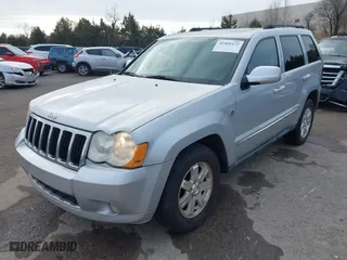 2009 Jeep Grand Cherokee Limited with VIN 1J8HR58P99C538725, listed as a IAAI auction lot 41466122 with 220,803 mi miles. Bid and sale history available at carsss.com. Image 2.