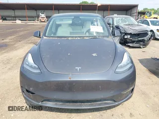 2021 Tesla Model Y Long Range z VIN 5YJYGDEE7MF140144, wystawiony jako IAAI lot #42350137 z przebiegiem Nie podano mil oraz . Historia ofert i sprzedaży dostępna na DreamBid. Obrazek 11.