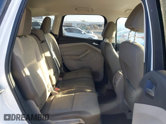 2016 Ford Escape SE with VIN 1FMCU0GX6GUB62475, listed as a IAAI auction lot 42006621 with 189,757 mi miles and . Bid and sale history available at carsss.com. Image 8.