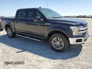 2019 Ford F-150 XL with VIN 1FTEW1E54KFB61479, listed as a Copart auction lot 53517095 with 104,201 mi miles and Salvage title. Bid and sale history available at DreamBid. Image 4.