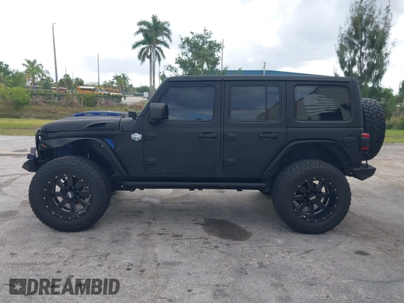 2018 Jeep Wrangler Unlimited Sport S z VIN 1C4HJXDG2JW228483, wystawiony jako IAAI lot #41710364 z przebiegiem 56 970 mil mil oraz . Historia ofert i sprzedaży dostępna na DreamBid. Obrazek 14.