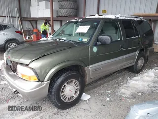2001 GMC Jimmy SLE with VIN 1GKDT13W212171101, listed as a IAAI auction lot 41546523 with 229,471 mi miles. Bid and sale history available at carsss.com. Image 17.