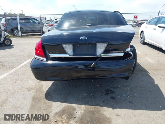 2008 Ford Police Interceptor z VIN 2FAFP71V98X160096, wystawiony jako IAAI lot #42041147 z przebiegiem 223 577 mil mil oraz . Historia ofert i sprzedaży dostępna na DreamBid. Obrazek 16.