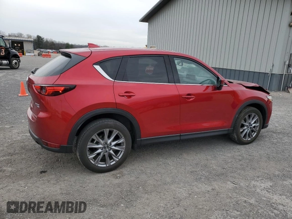 2021 Mazda CX-5 Grand Touring Reserve with VIN JM3KFBAY3M0315640, listed as a Copart auction lot 51004955 with 21,981 mi miles and Salvage Title. Bid and sale history available at DreamBid. Image 3.