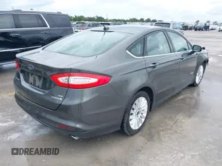 2015 Ford Fusion SE Hybrid with VIN 3FA6P0LU7FR254503, listed as a IAAI auction lot 42475860 with 169,980 mi miles and . Bid and sale history available at DreamBid. Image 4.