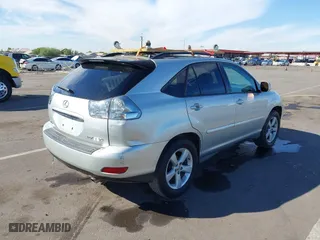 2005 Lexus RX 330 with VIN 2T2GA31U05C027884, listed as a IAAI auction lot 40676404 with 235,915 mi miles. Bid and sale history available at carsss.com. Image 4.