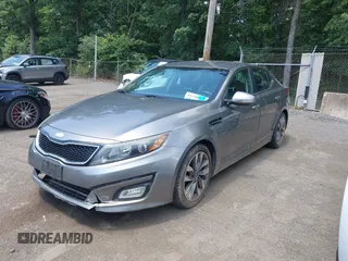 2014 Kia Optima SX with VIN 5XXGR4A75EG270693, listed as a IAAI auction lot 42606134 with 126,486 mi miles and . Bid and sale history available at DreamBid. Image 2.