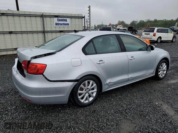 2011 Volkswagen Jetta SE with VIN 3VWDZ7AJ5BM319091, listed as a Copart auction lot 57991585 with 185,458 mi miles and Salvage title. Bid and sale history available at DreamBid. Image 3.