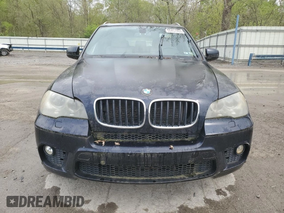 2012 BMW X5 35i z VIN 5UXZV4C5XCL748652, wystawiony jako Copart lot #55457455 z przebiegiem 149 030 mil mil oraz Szkoda całkowita • Salvage title. Historia ofert i sprzedaży dostępna na DreamBid. Obrazek 5.