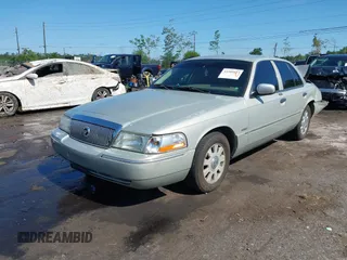 2004 Mercury Grand Marquis LS Premium z VIN 2MEHM75W64X681851, wystawiony jako IAAI lot #42389437 z przebiegiem 118 153 mil mil oraz . Historia ofert i sprzedaży dostępna na DreamBid. Obrazek 2.