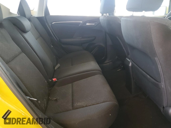 2015 Honda Fit EX-L z VIN 3HGGK5H8XFM765160, wystawiony jako Copart lot #55809025 z przebiegiem 77 631 mil mil oraz Szkoda całkowita • Salvage title. Historia ofert i sprzedaży dostępna na DreamBid. Obrazek 10.