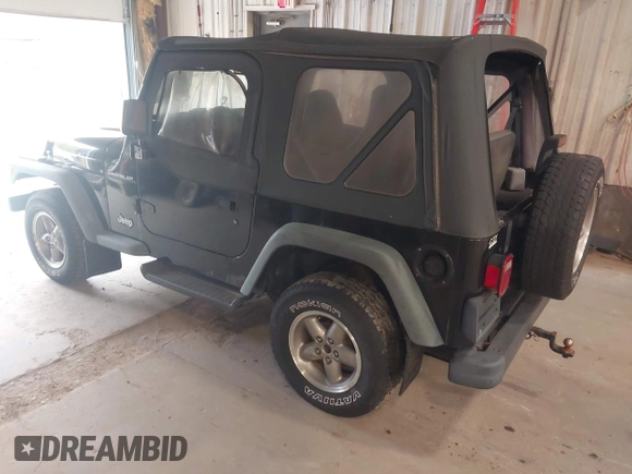 1999 Jeep Wrangler SE with VIN 1J4FY29PXXP409455, listed as a IAAI auction lot 42234313 with 56,252 mi miles and . Bid and sale history available at DreamBid. Image 3.