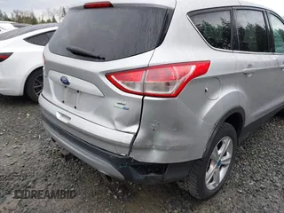 2013 Ford Escape SE with VIN 1FMCU9G94DUC37269, listed as a IAAI auction lot 41896473 with 130,391 mi miles. Bid and sale history available at carsss.com. Image 6.