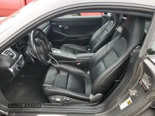 2015 Porsche Cayman with VIN WP0AA2A89FK163969, listed as a Copart auction lot 52825275 with 118,675 mi miles and Salvage Title. Bid and sale history available at DreamBid. Image 7.