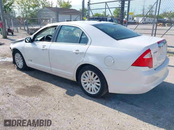 2012 Ford Fusion Hybrid with VIN 3FADP0L38CR255511, listed as a IAAI auction lot 42381063 with 82,083 mi miles and . Bid and sale history available at DreamBid. Image 3.
