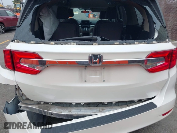 2019 Honda Odyssey EX with VIN 5FNRL6H58KB089810, listed as a IAAI auction lot 42510301 with 38,615 mi miles and . Bid and sale history available at DreamBid. Image 6.
