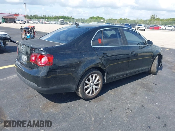 2010 Volkswagen Jetta Limited Edition z VIN 3VWRX7AJ4AM054934, wystawiony jako IAAI lot #42539609 z przebiegiem 245 048 mil mil oraz . Historia ofert i sprzedaży dostępna na DreamBid. Obrazek 4.