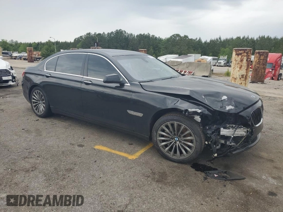 2012 BMW 7 Series 740Li with VIN WBAKB4C59CC576476, listed as a Copart auction lot 55670215 with 100,907 mi miles and Salvage title. Bid and sale history available at DreamBid. Image 4.