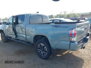2022 Toyota Tacoma SR5 z VIN 3TMBZ5DN3NM034388, wystawiony jako IAAI lot #42270543 z przebiegiem 179 904 mil mil oraz . Historia ofert i sprzedaży dostępna na DreamBid. Obrazek 3.